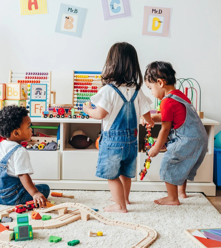 Two toddlers playing in the church kids playroom